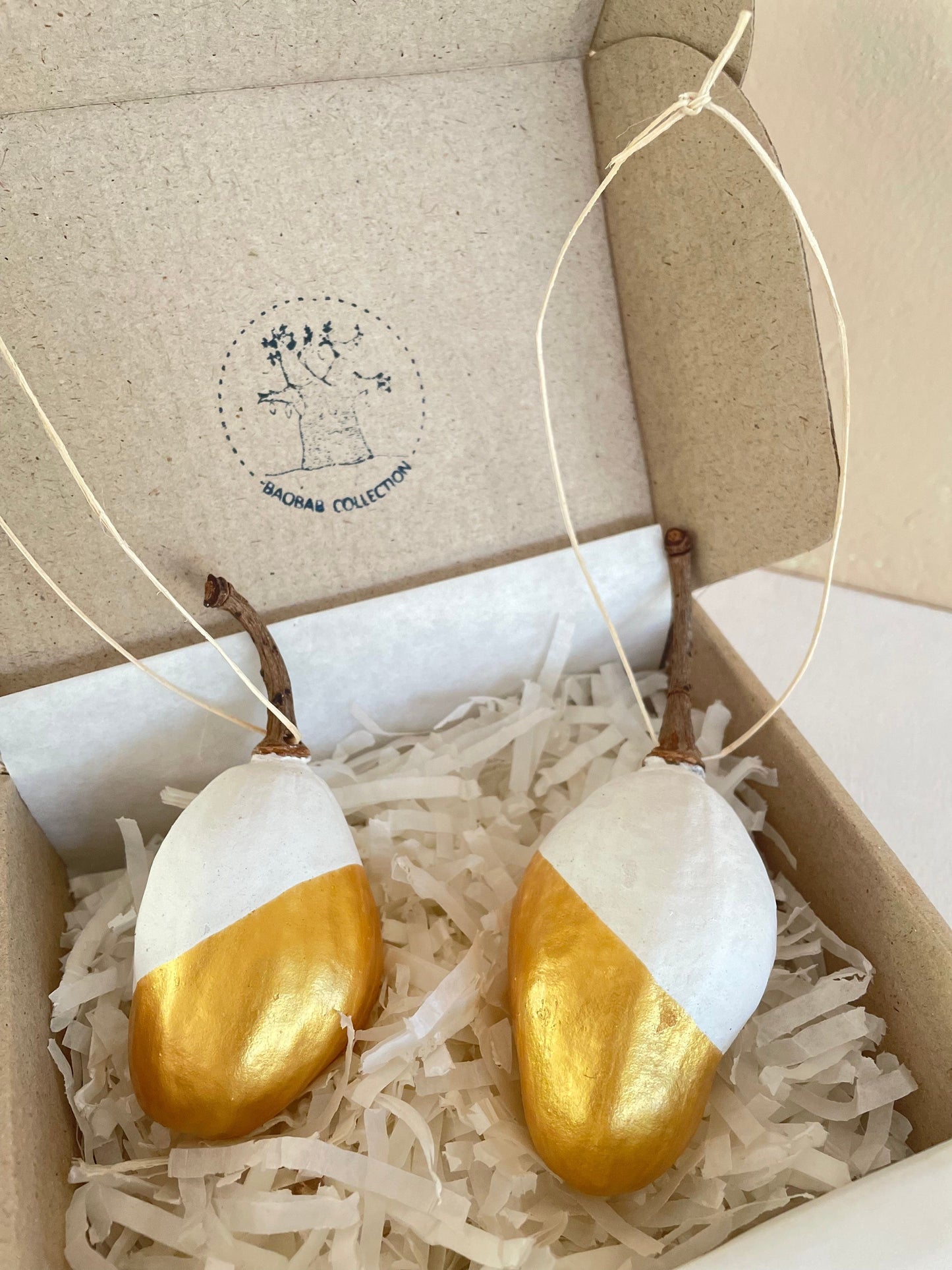 Set of 2 Christmas Baubles. These decorations are crafted by Seedling Designs skilled artisans with dedication and love. Handmade in Kenya